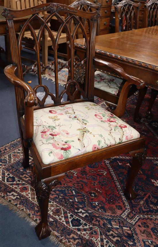 A set of twelve Chippendale revival walnut dining chairs, probably Maple & Co.